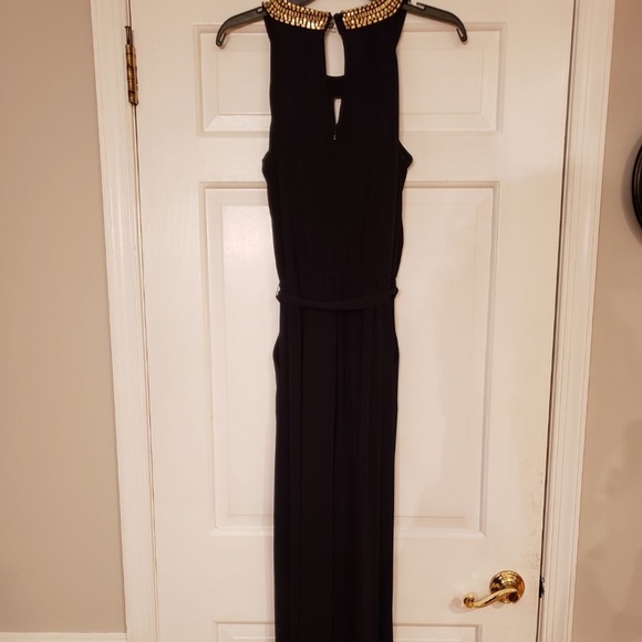 a full length black jumpsuit with a gold neckline - Picture 4 of 4